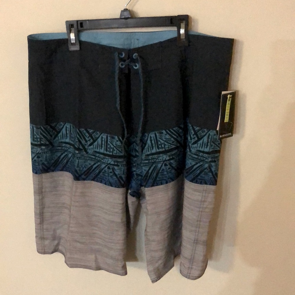 Mens swim trunks. Never worn. New with tags.